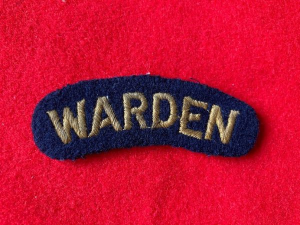 WARDEN shoulder title